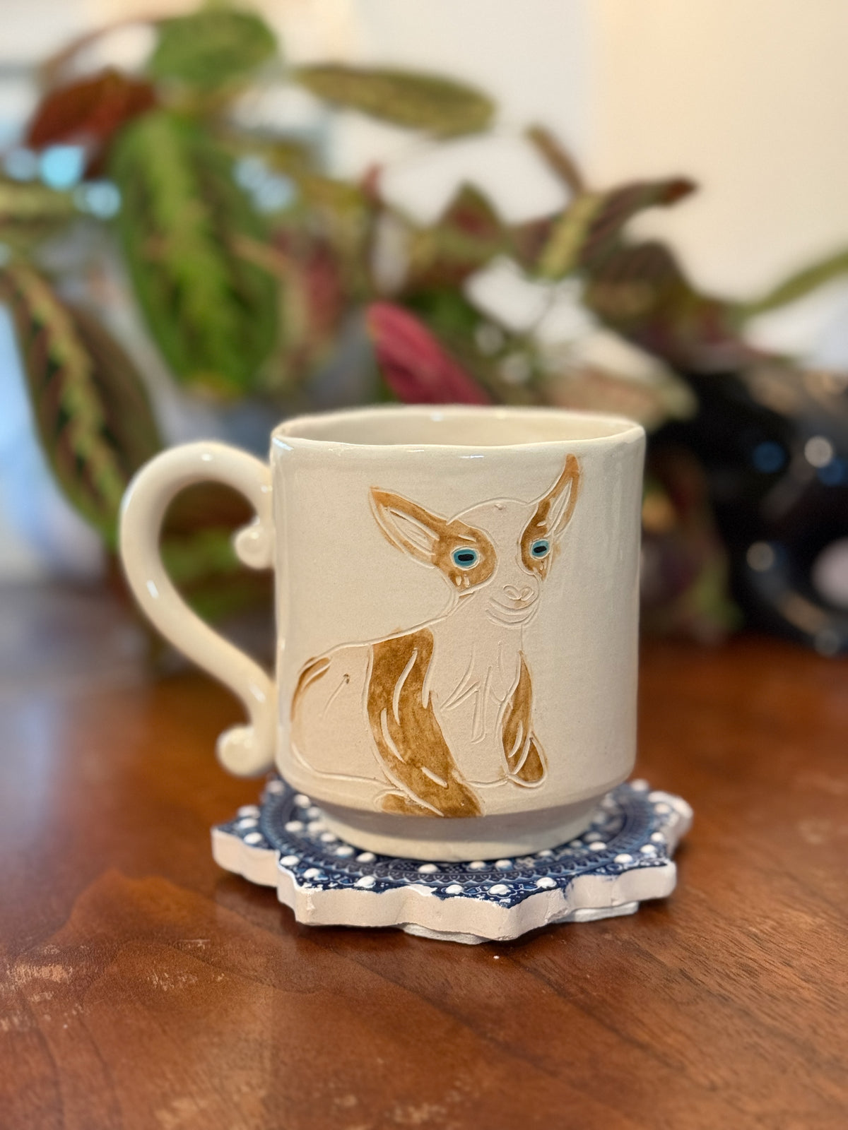 Contemplating baby goat mug