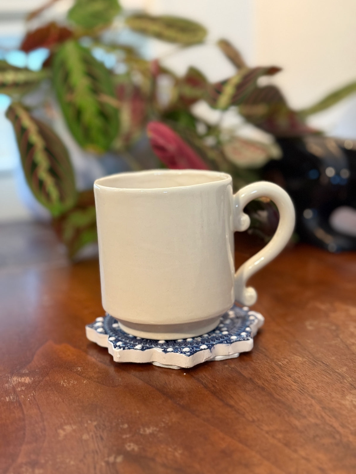 Contemplating baby goat mug